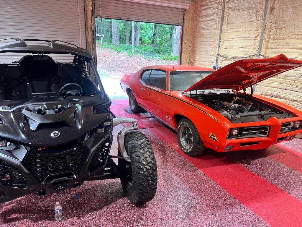 Can-Am and Pontiac GTO in the shop